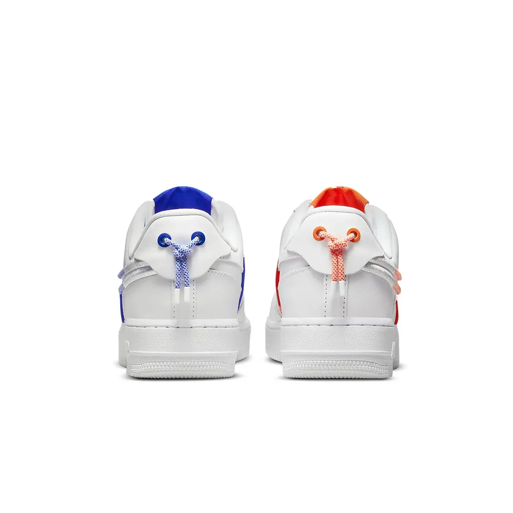 Логотип Nike на пятке, белая основа с оранжево-синими деталями. Уникальный акцент